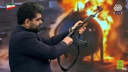 Prezantuesi iranian qëllon me armë drejt flamurit të Emirateve të Bashkuara Arabe Prezantuesi iranian qëllon me armë drejt flamurit të Emirateve të Bashkuara Arabe